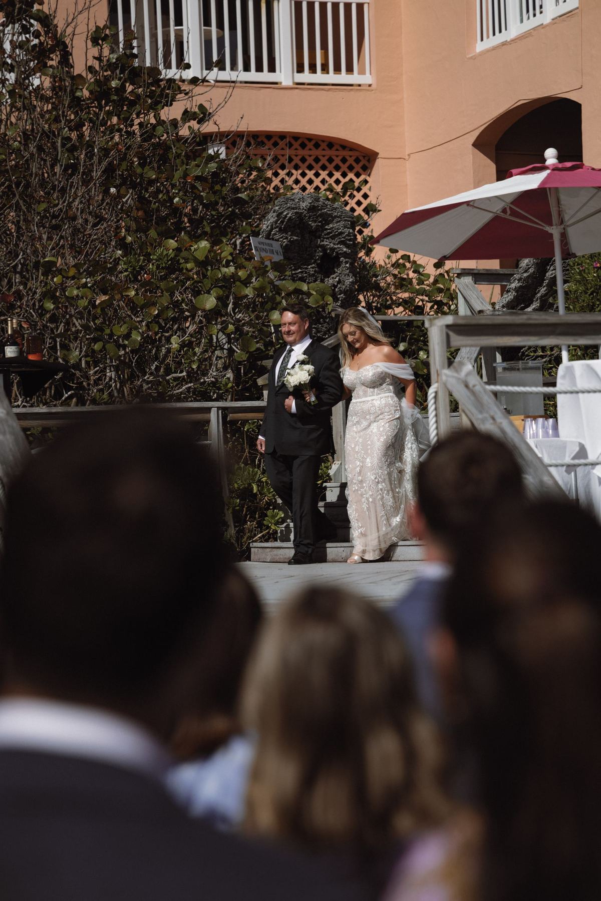 Emotional guest reactions during outdoor Bermuda wedding ceremony