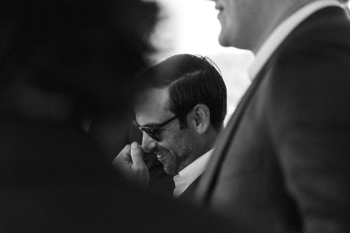 A quiet emotional moment wiping away a tear before the ceremony on Hawkins Island, Bermuda, black and white