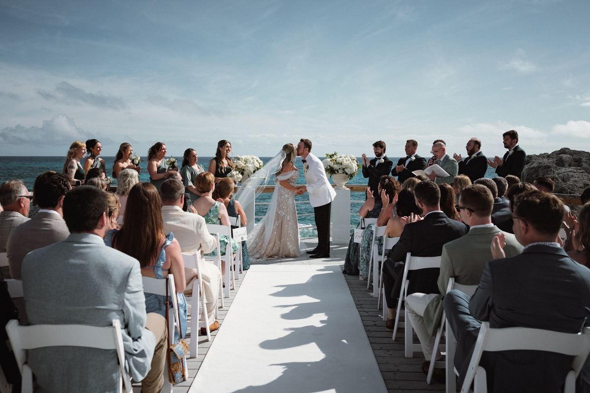 Bride processional walk down aisle at Bermuda cliffside wedding ceremony