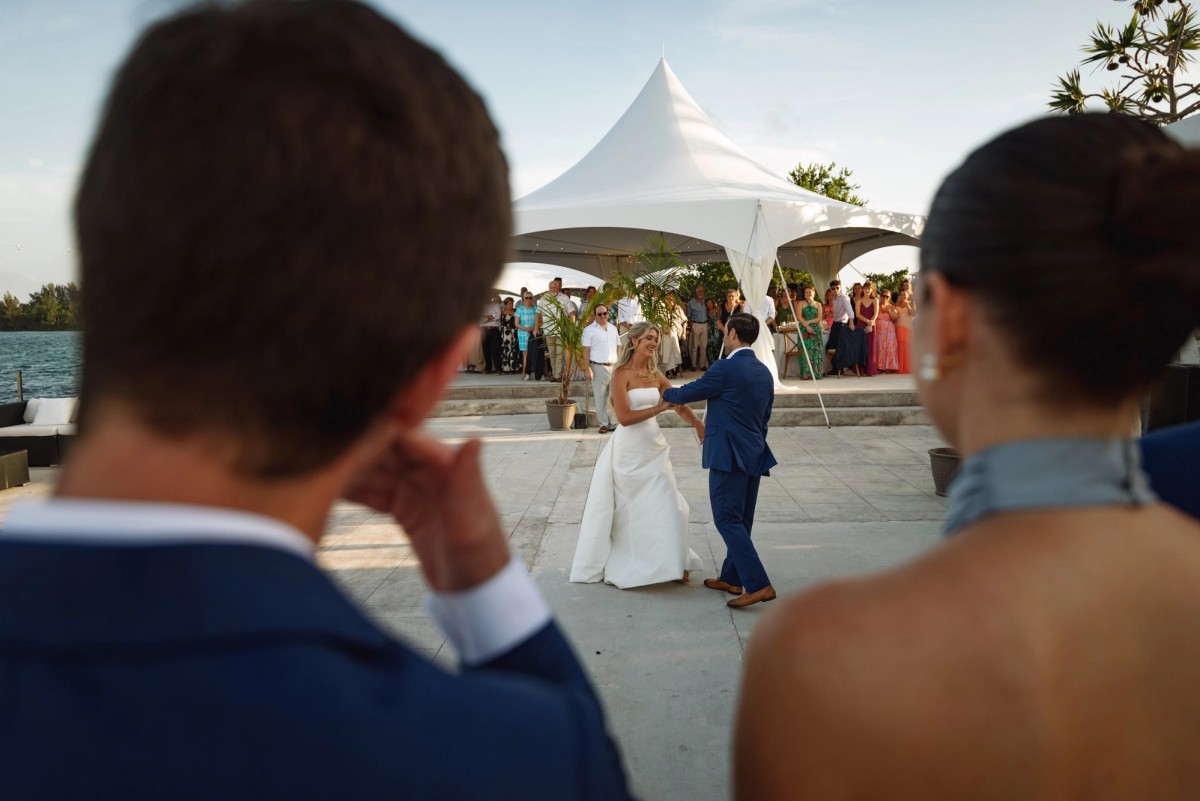 Guests watch the first dance from the edge of the floor on Hawkins Island, Bermuda
