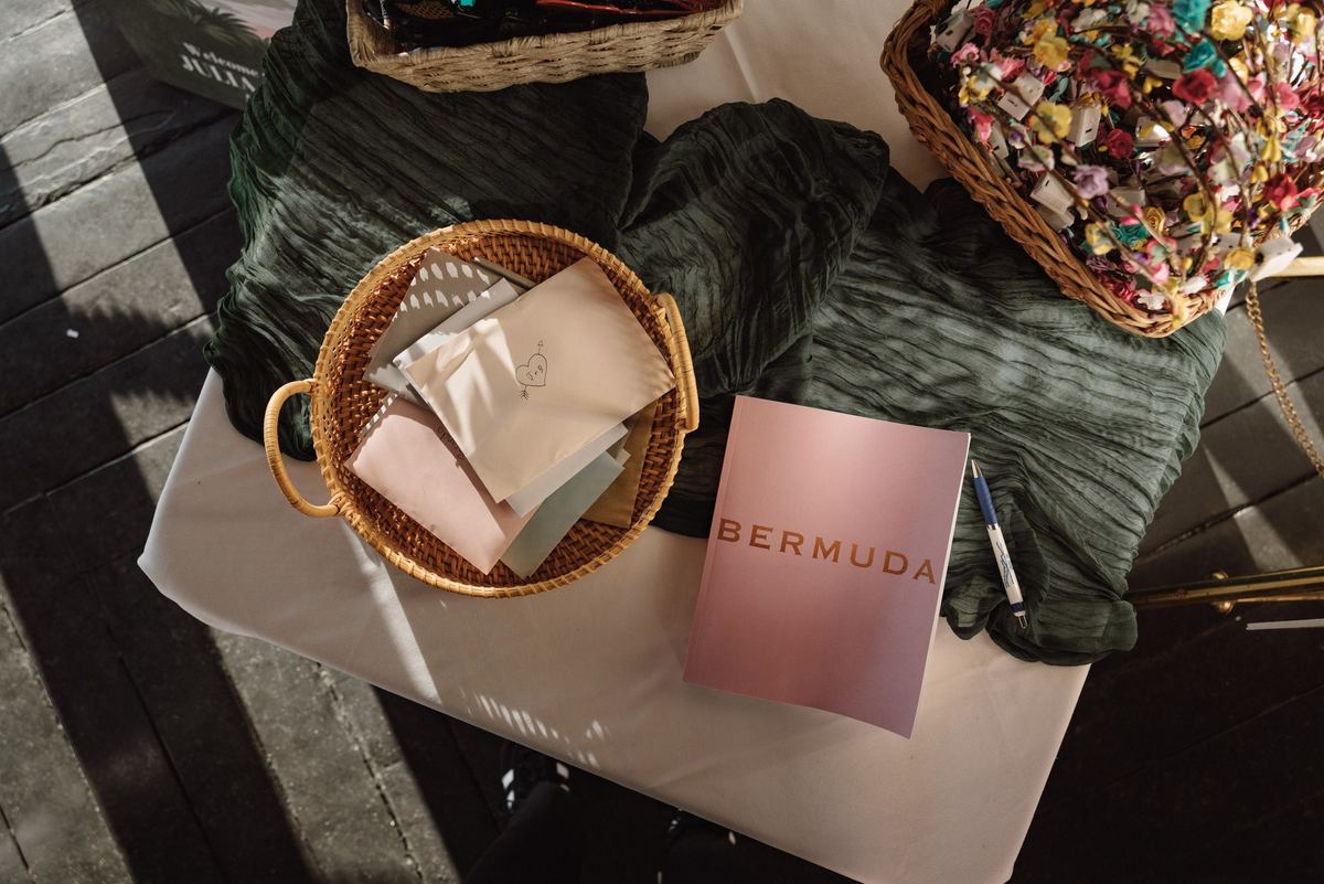 Welcome basket with Bermuda guidebook detail at destination wedding