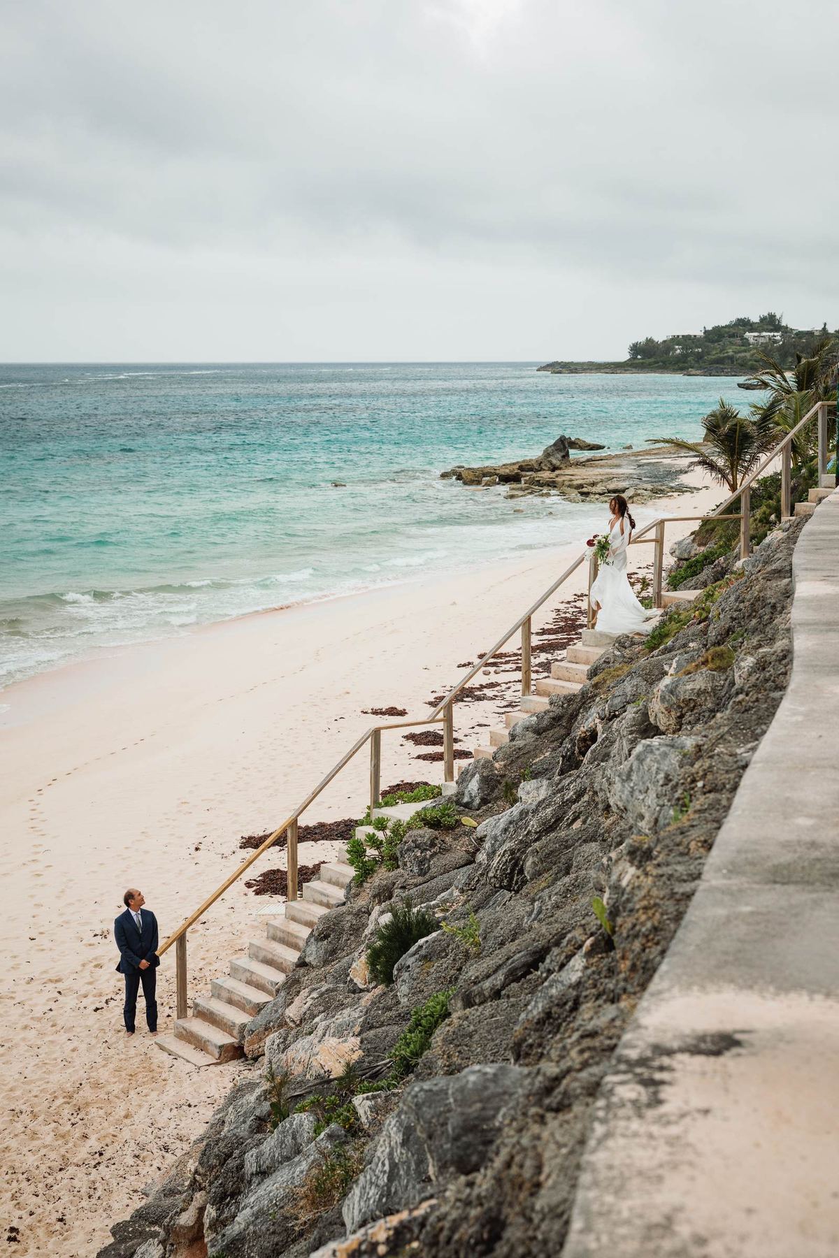 Cliff path leading down to the Bermuda beach with a lone figure below