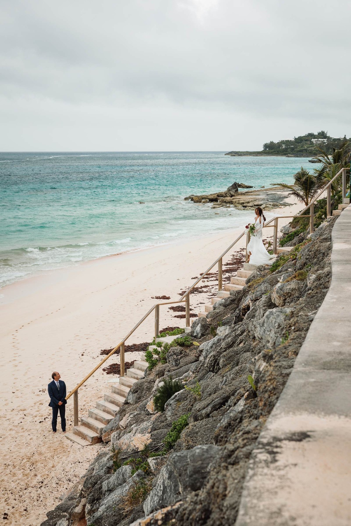 Cliff path leading down to the Bermuda beach with a lone figure below