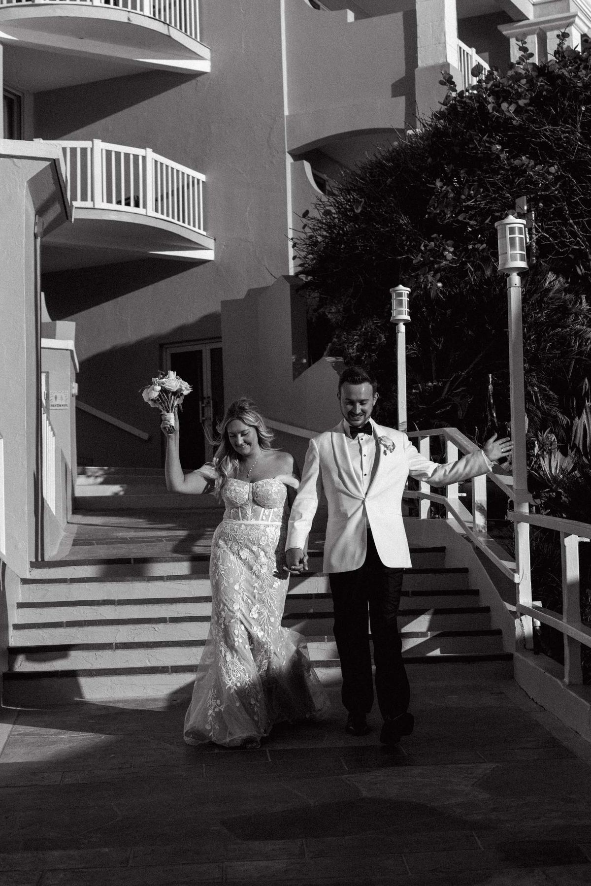 Black and white couple entrance into Bermuda wedding reception
