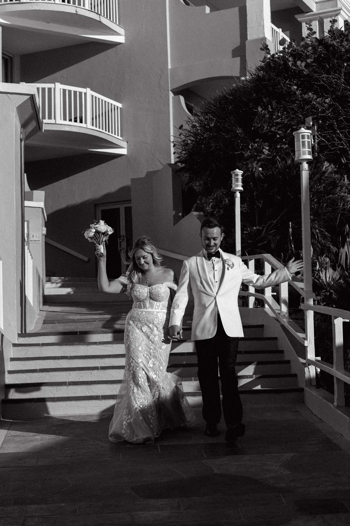 Black and white couple entrance into Bermuda wedding reception