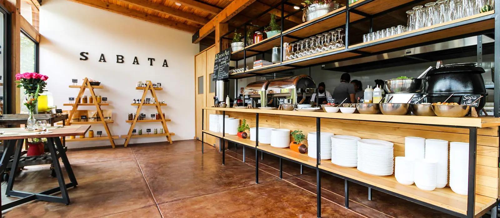 Sabata interior with shelving and kitchen