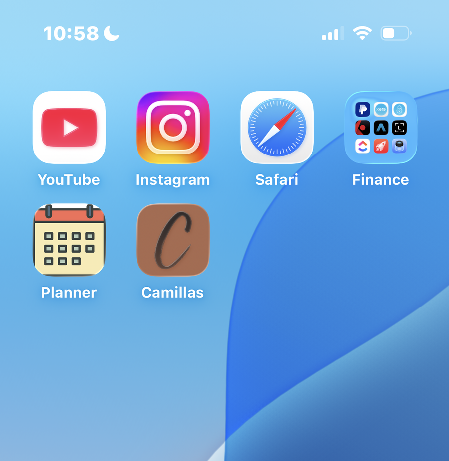 An iPhone home screen showing apps like YouTube, Instagram, Safari, and a Finance folder, with Phone, Calendar, and WhatsApp in the dock, all on an abstract blue and white wallpaper.