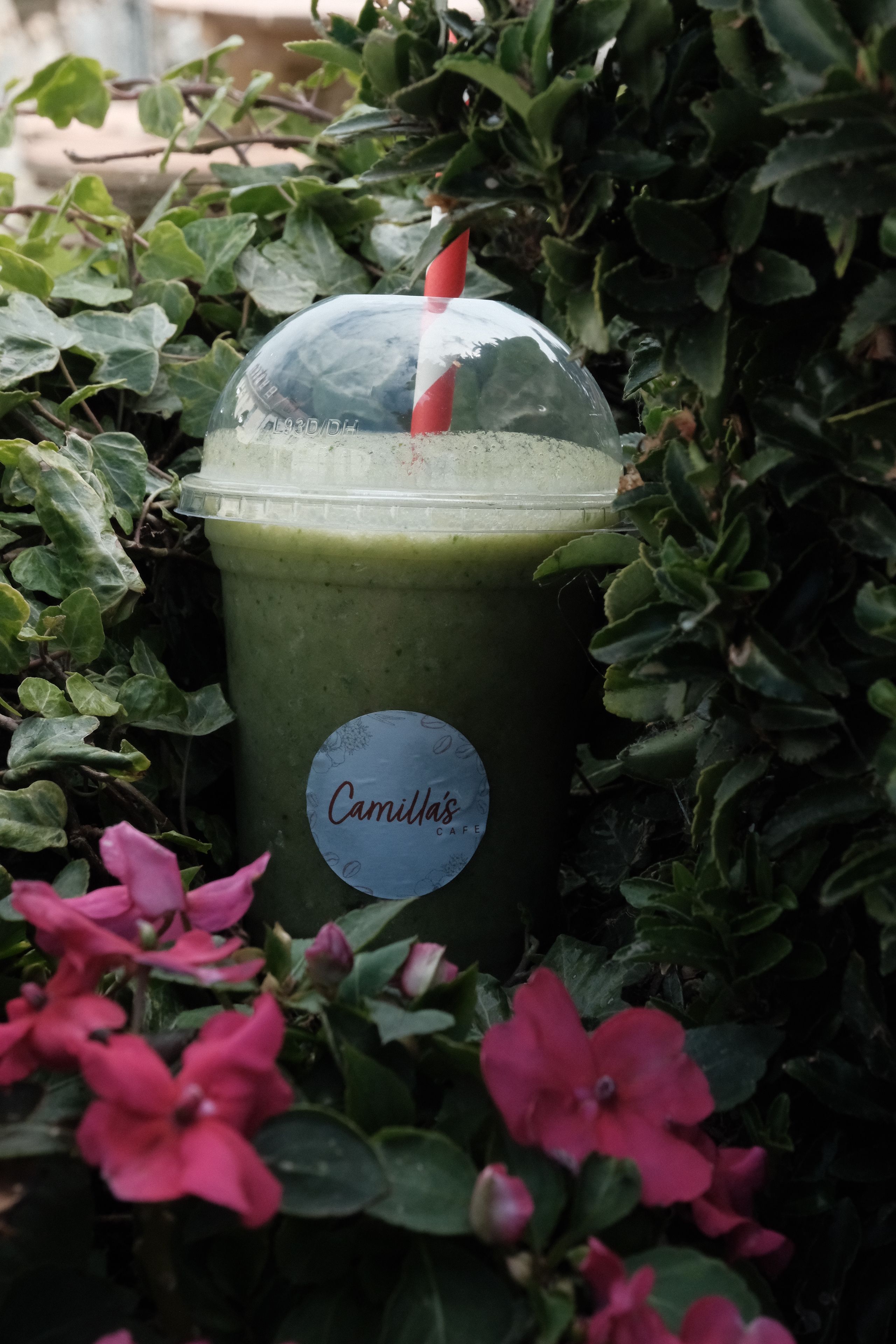 A green kale smoothie in a glass