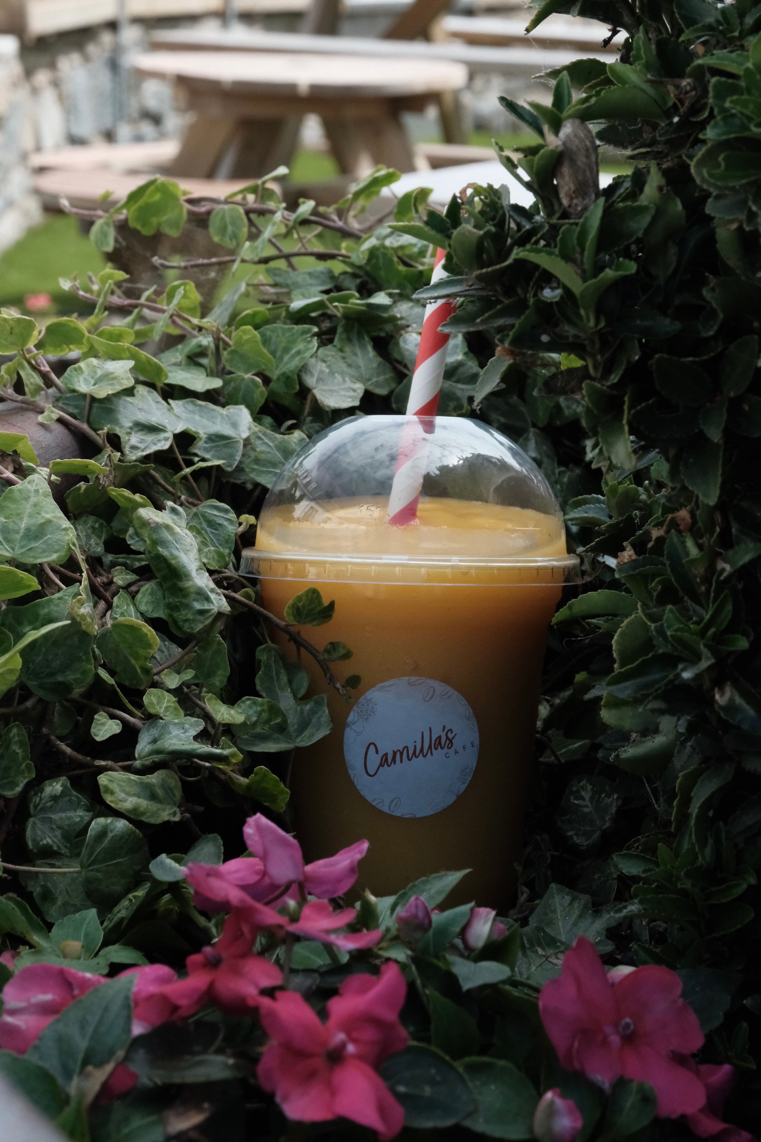 A mango smoothie in a glass