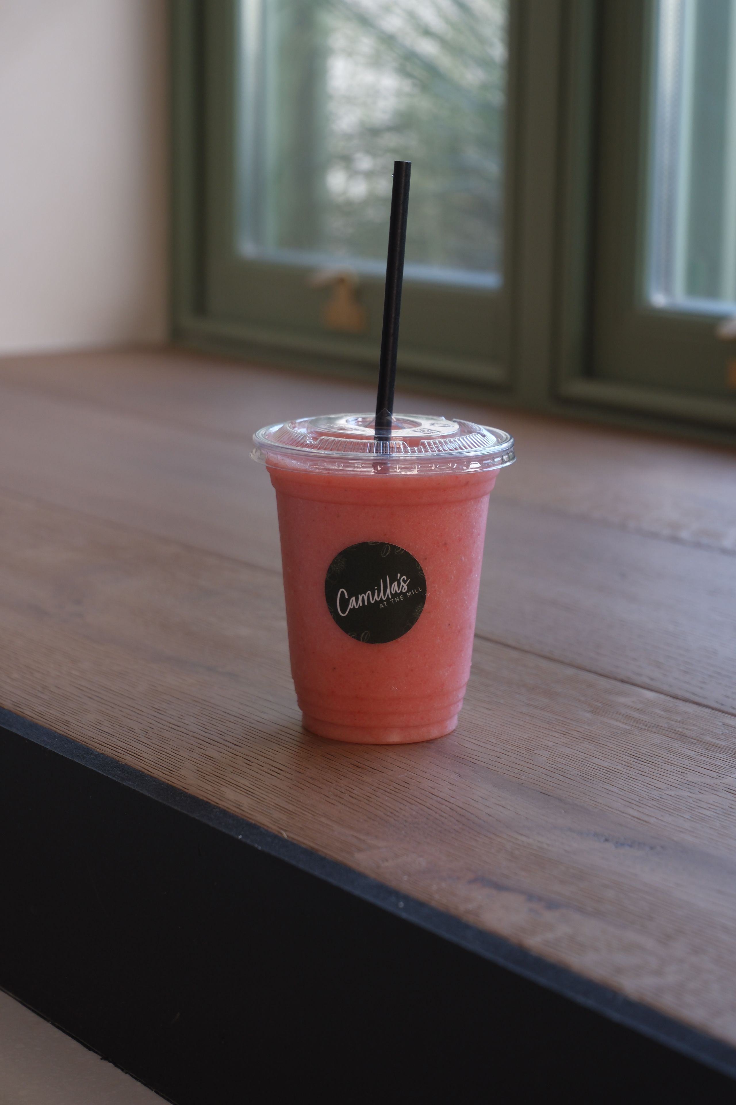 A strawberry smoothie in a glass