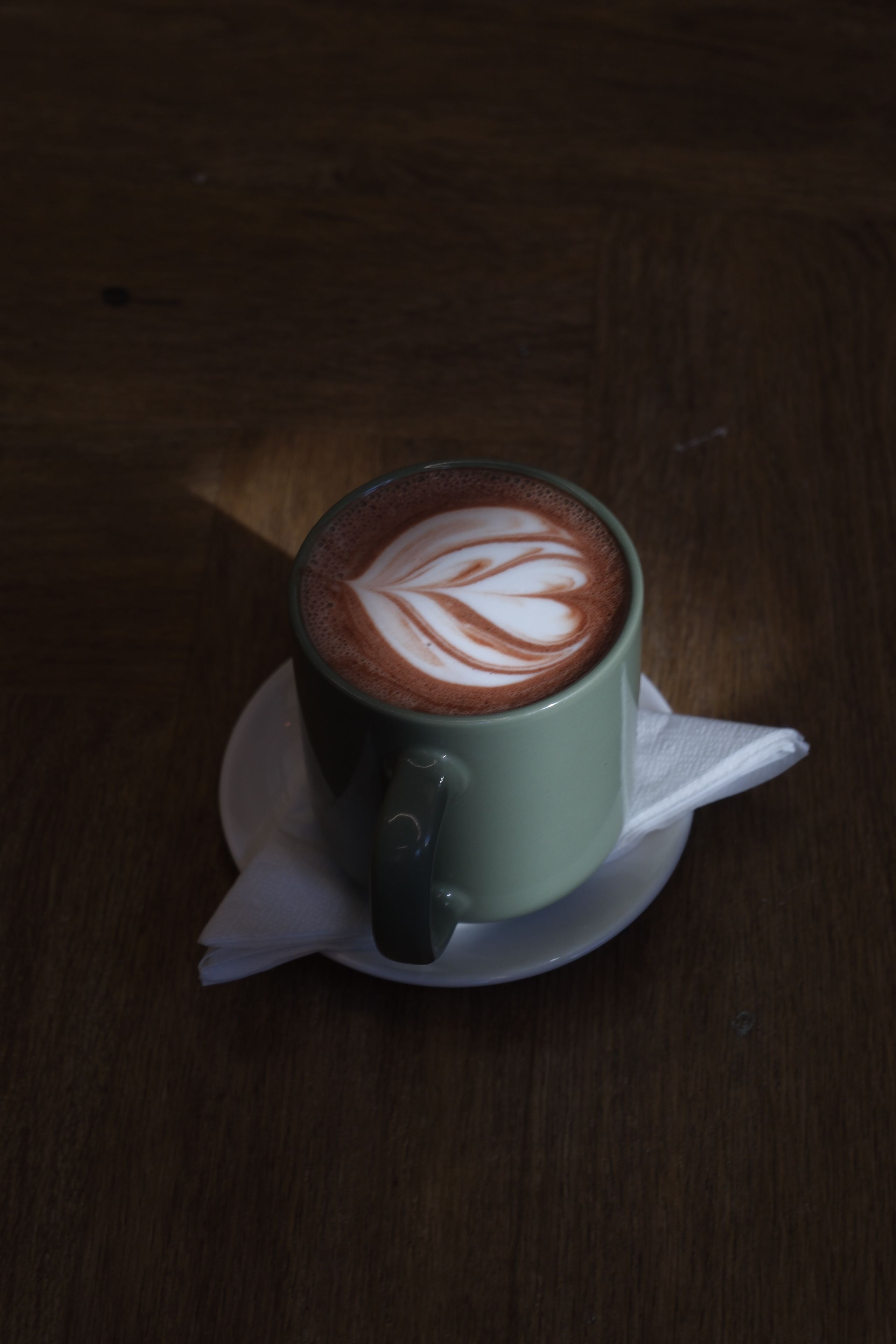 A hot chocolate topped with cream