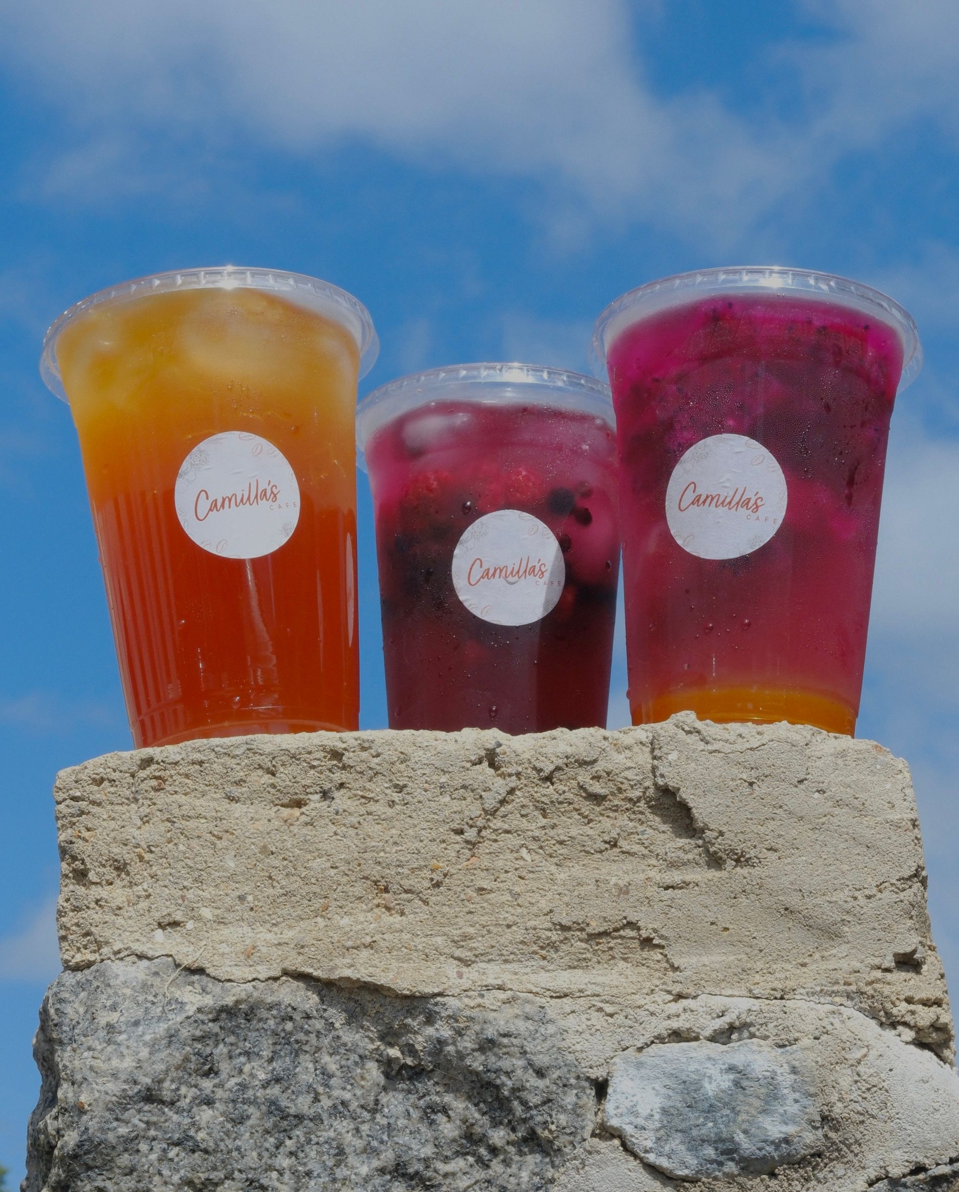 A berry refresher drink over ice