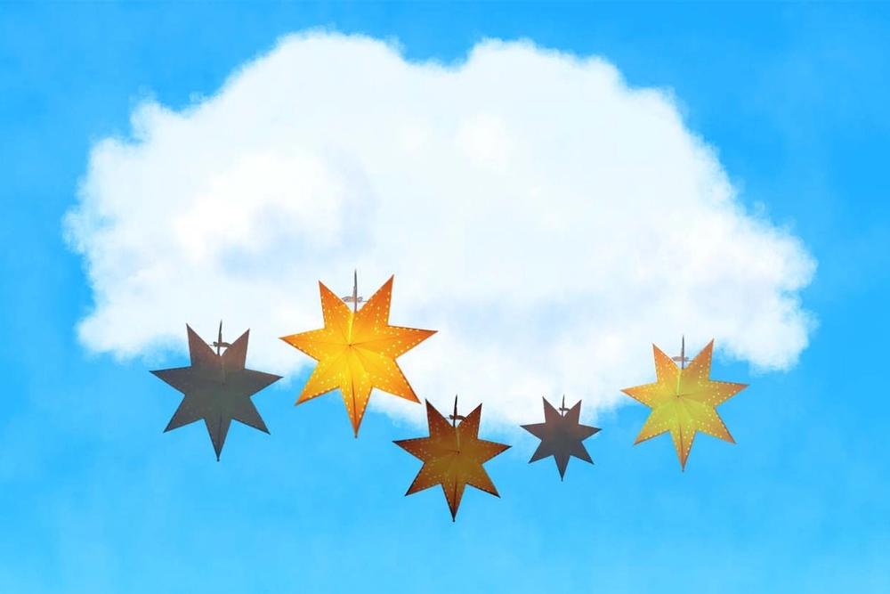 Illustration of 5 golden stars hanging under a cloud
