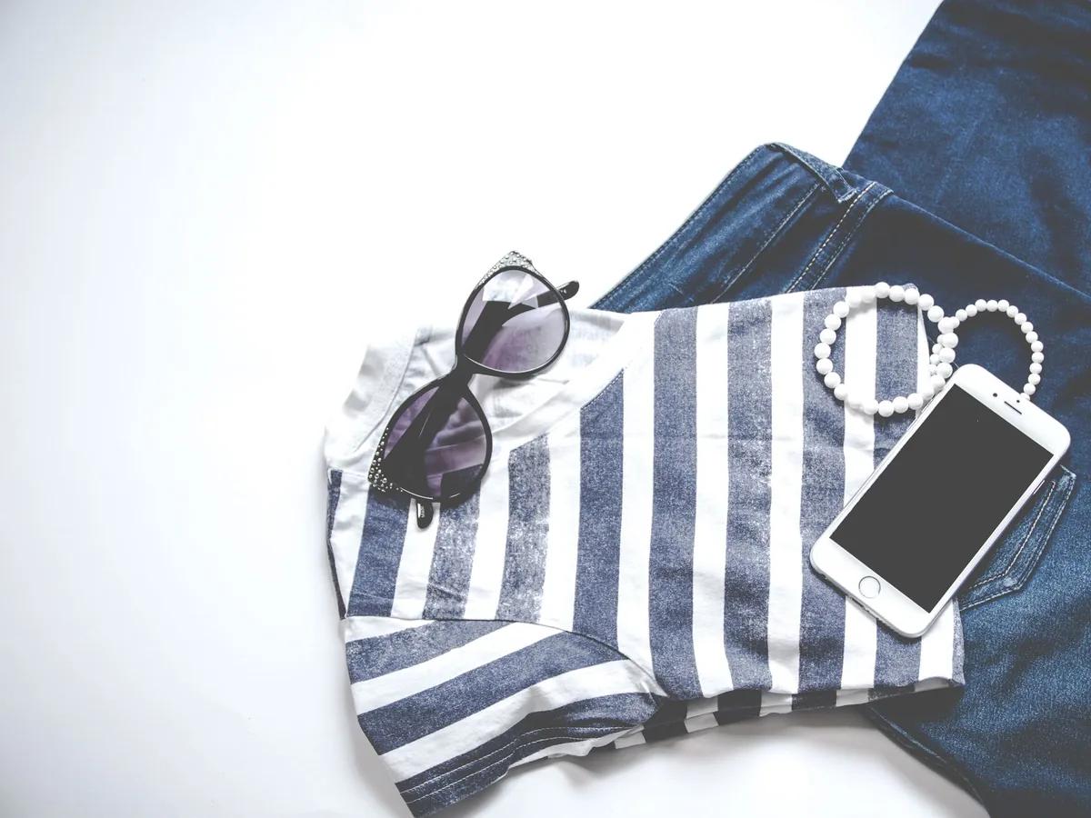 Secondhand clothing laid out for online resale
