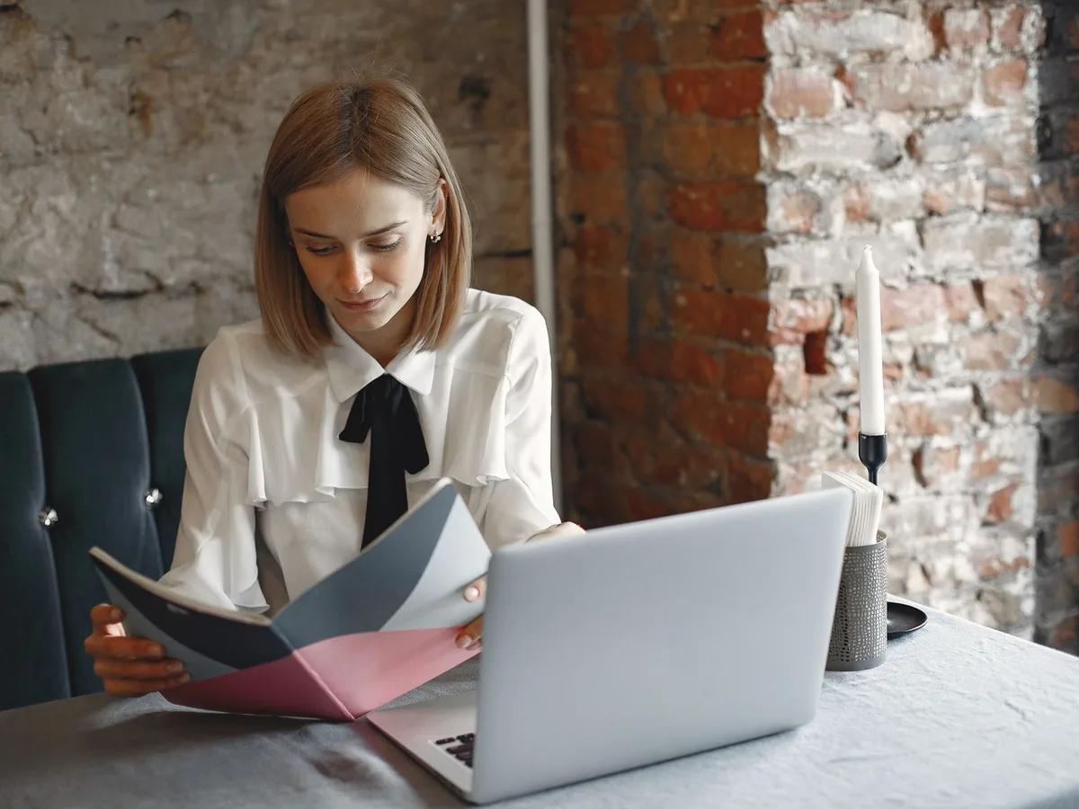 New reseller tracking their numbers on a laptop