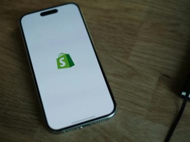 Shopify icon on mobile phone