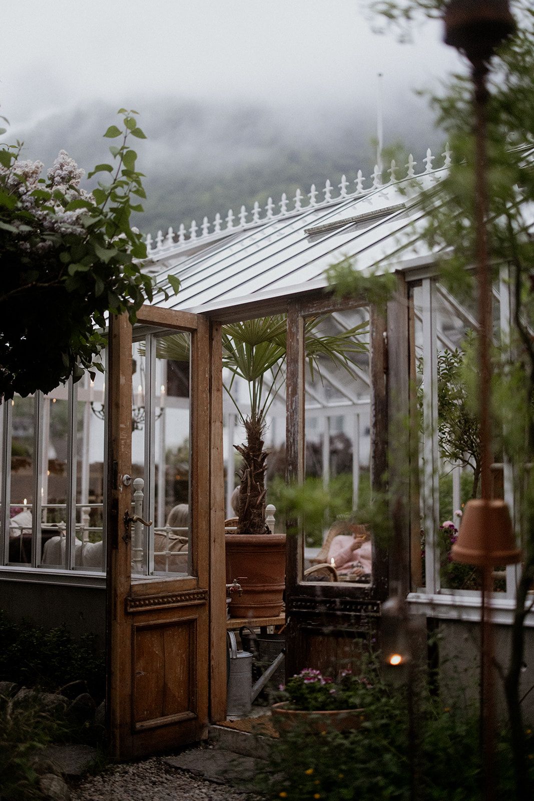 The atmospheric greenhouse at Hotel Sundal – a green oasis for dining and tranquility.