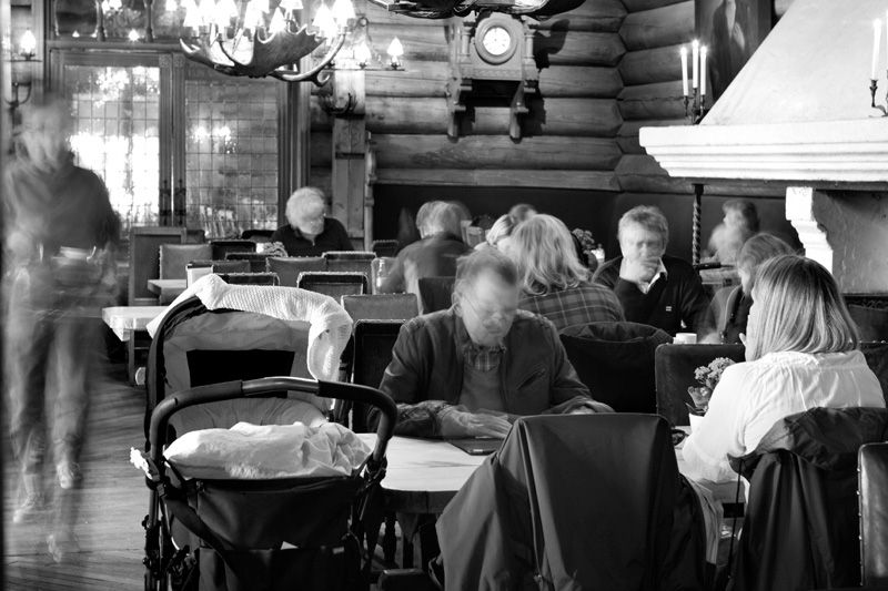 Black and white interior photo of the café.