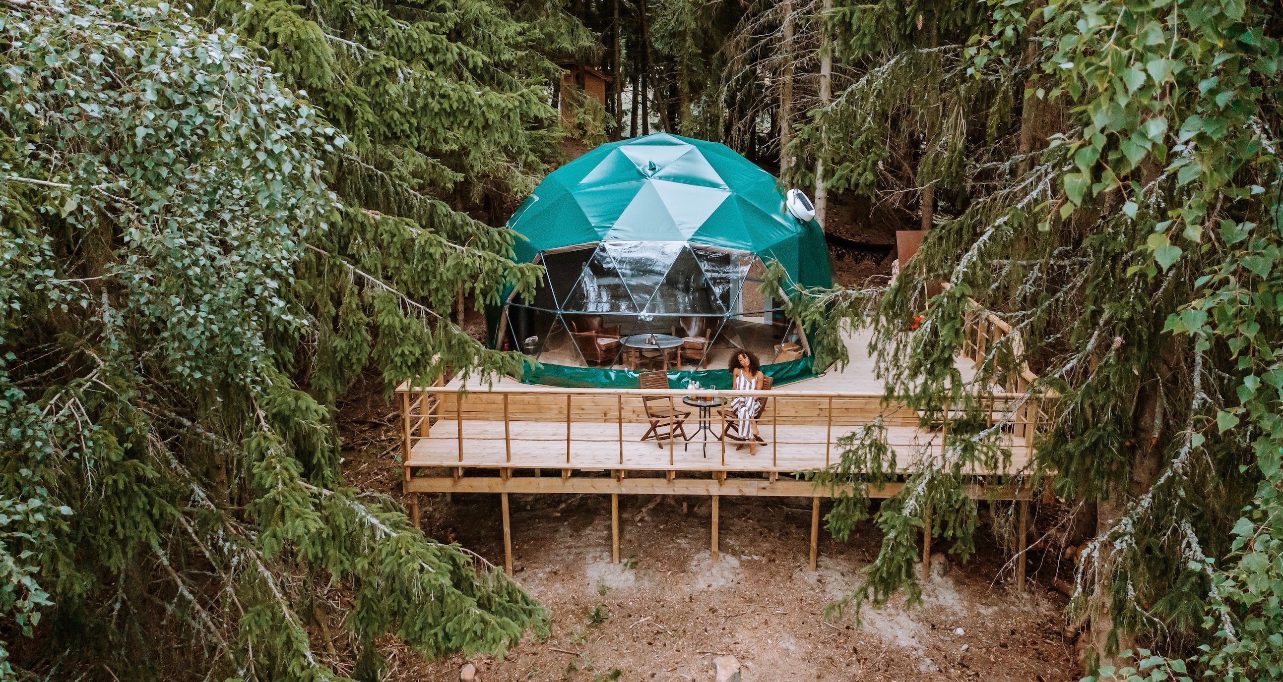 The dome seen from a drone with trees around   