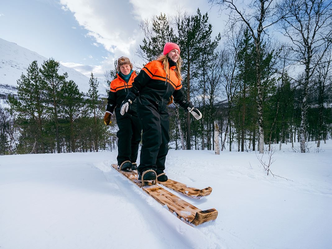 Trying out duoskis (skis that hold two people)