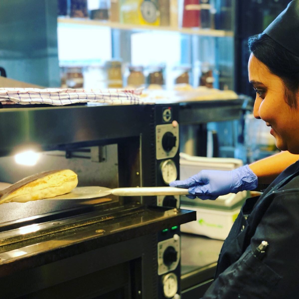 Chef preparing food at Indie restaurant