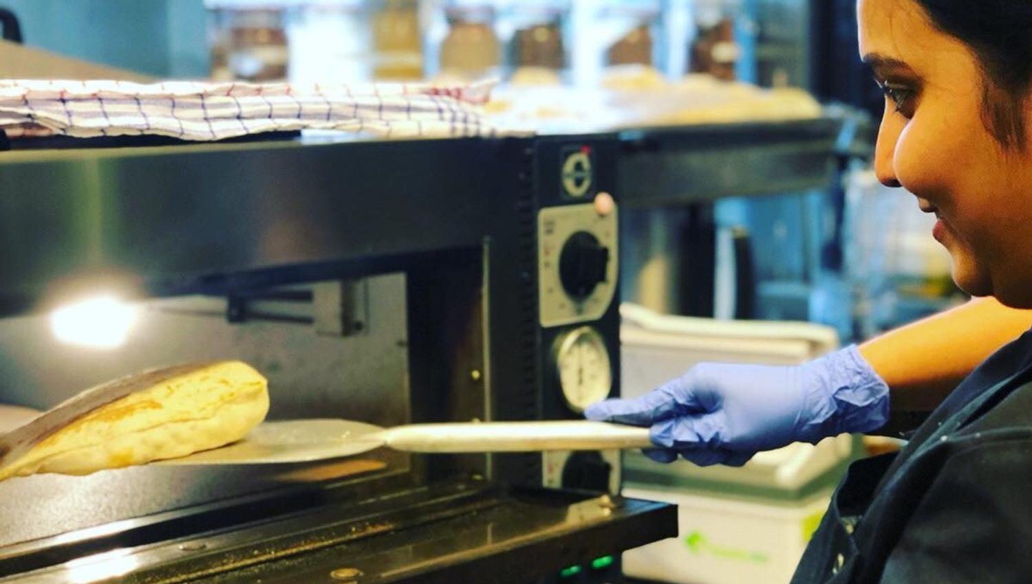 Chef preparing food at Indie restaurant