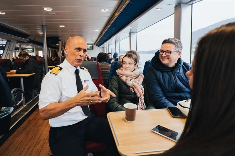 The captain having a chat with travellers