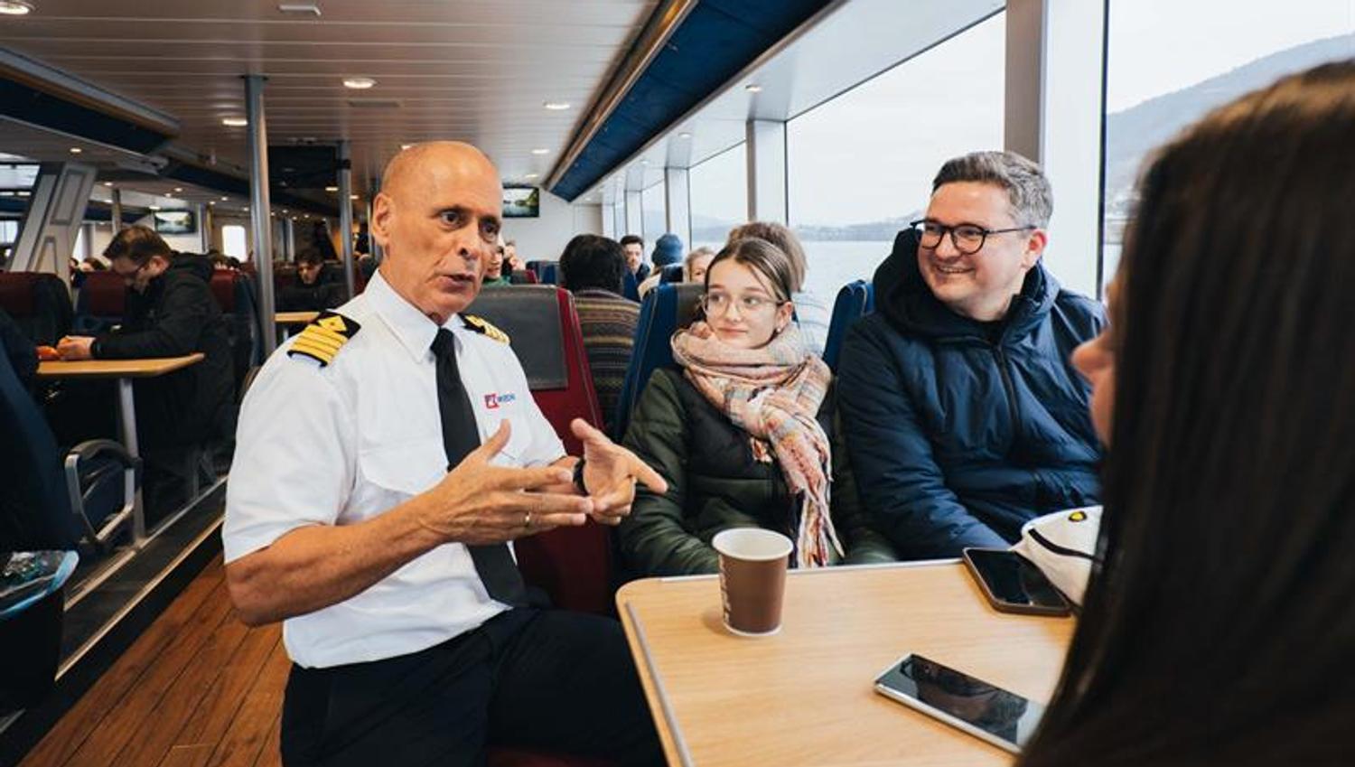 The captain having a chat with travellers