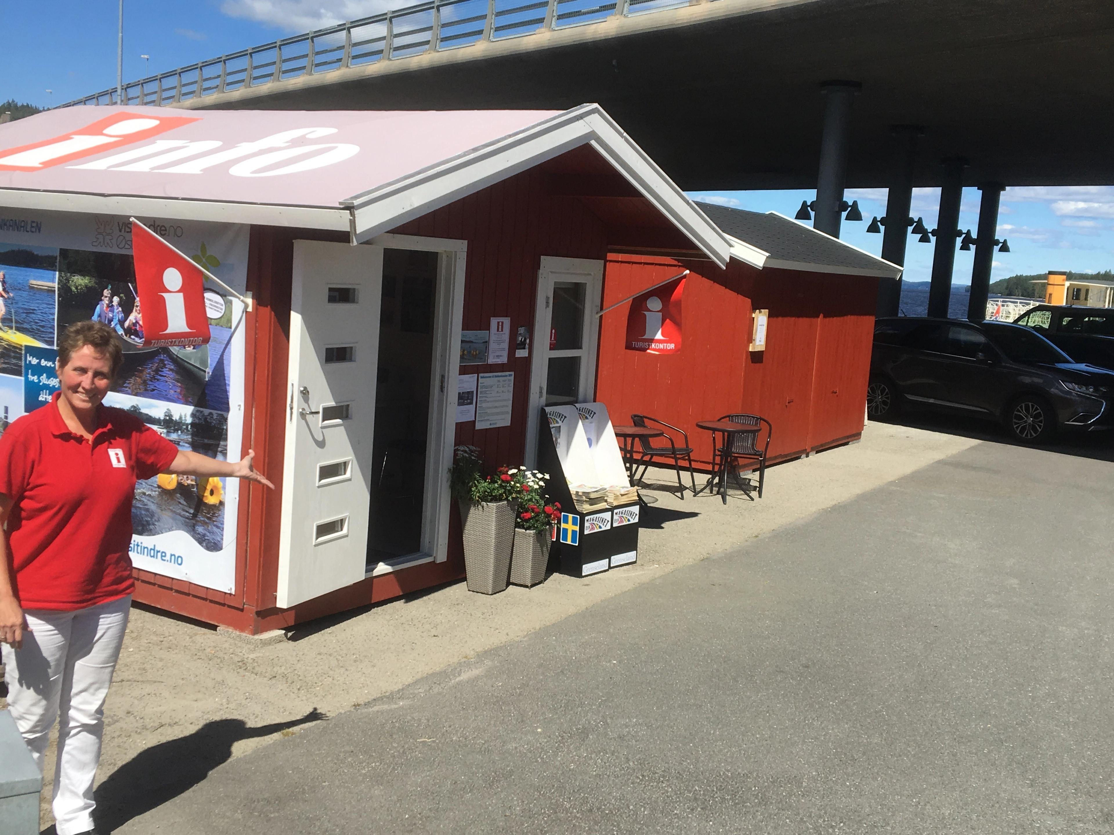 Tourist host outside the tourist information office