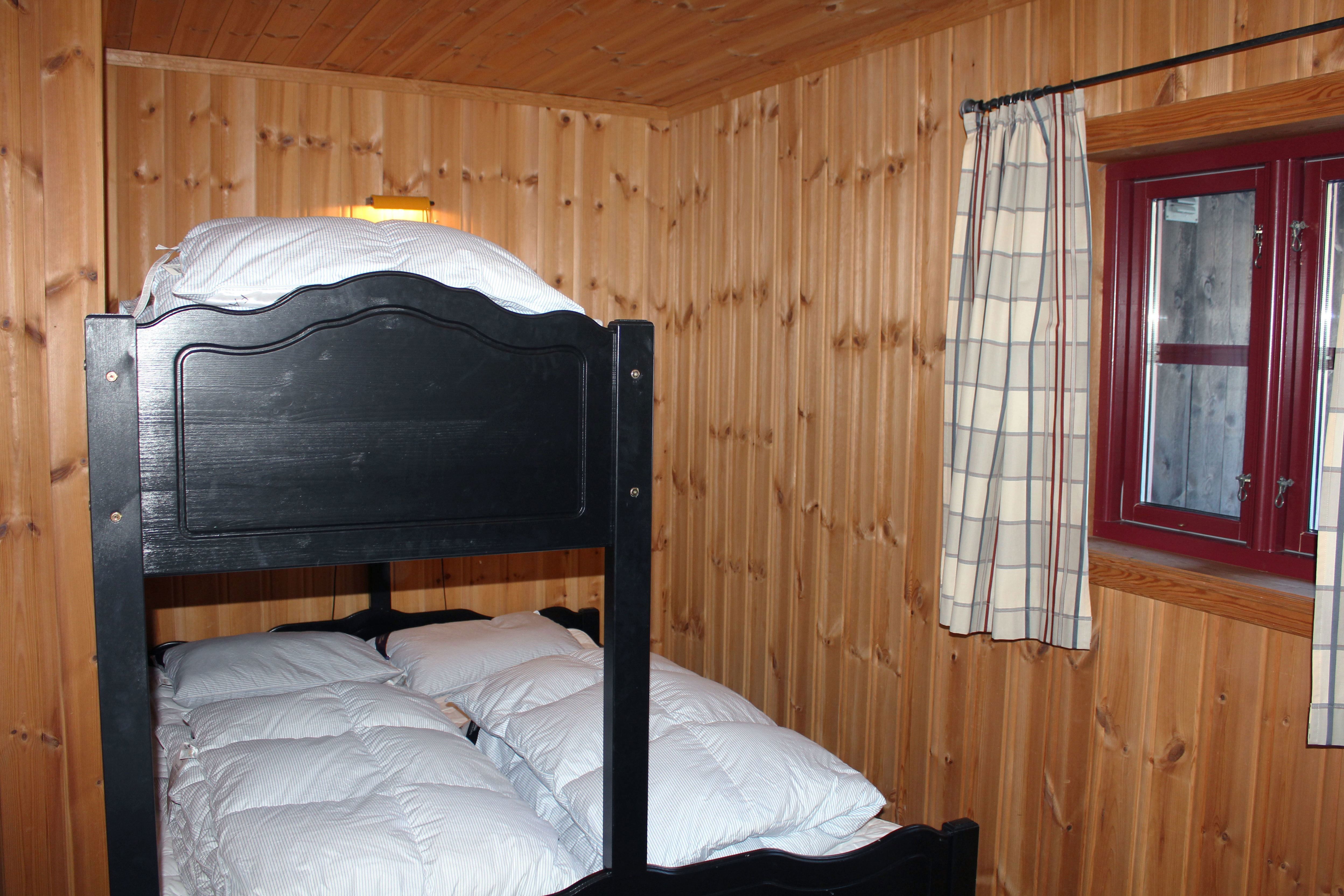 A bunk bed in a room.