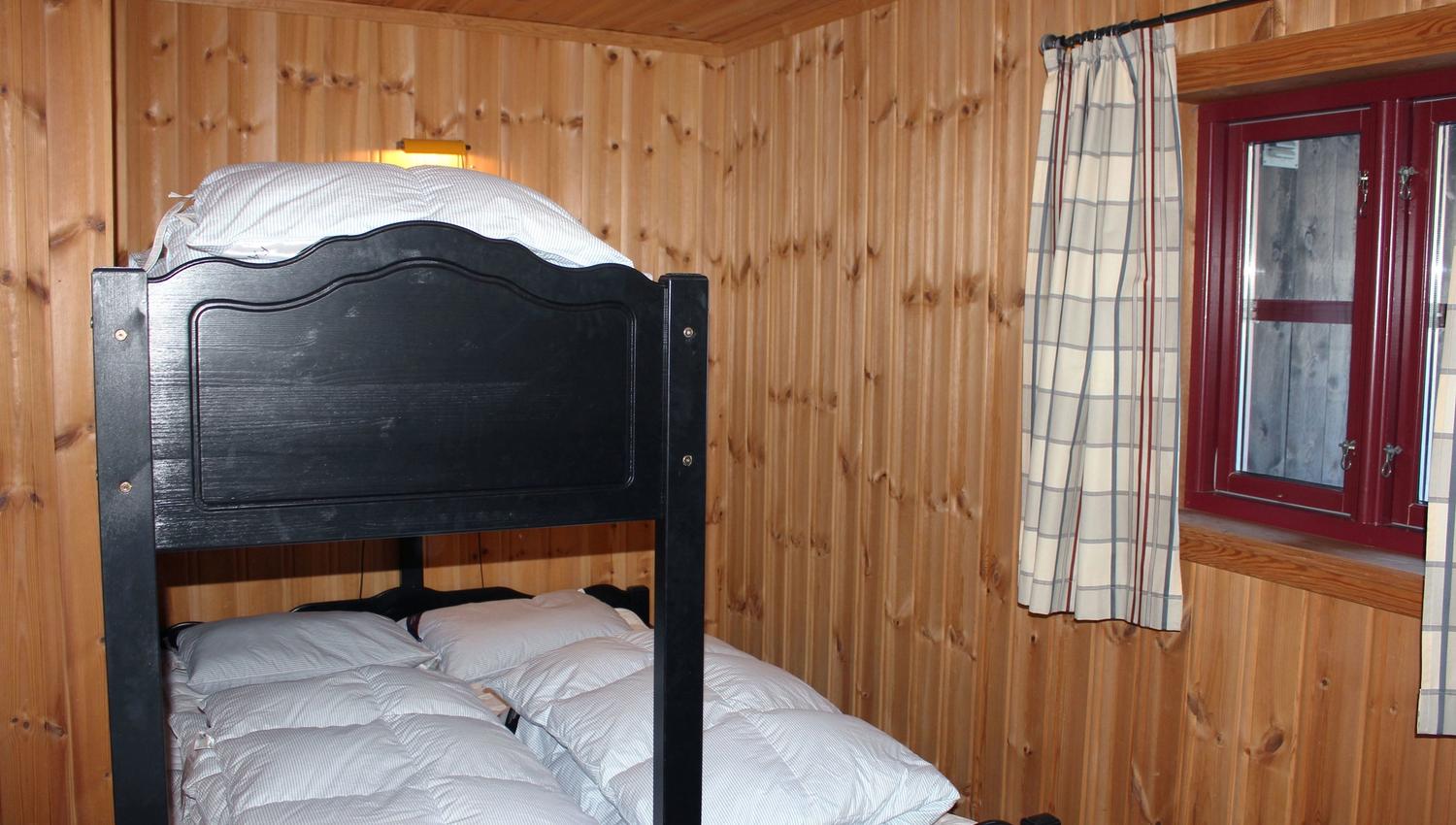 A bunk bed in a room.