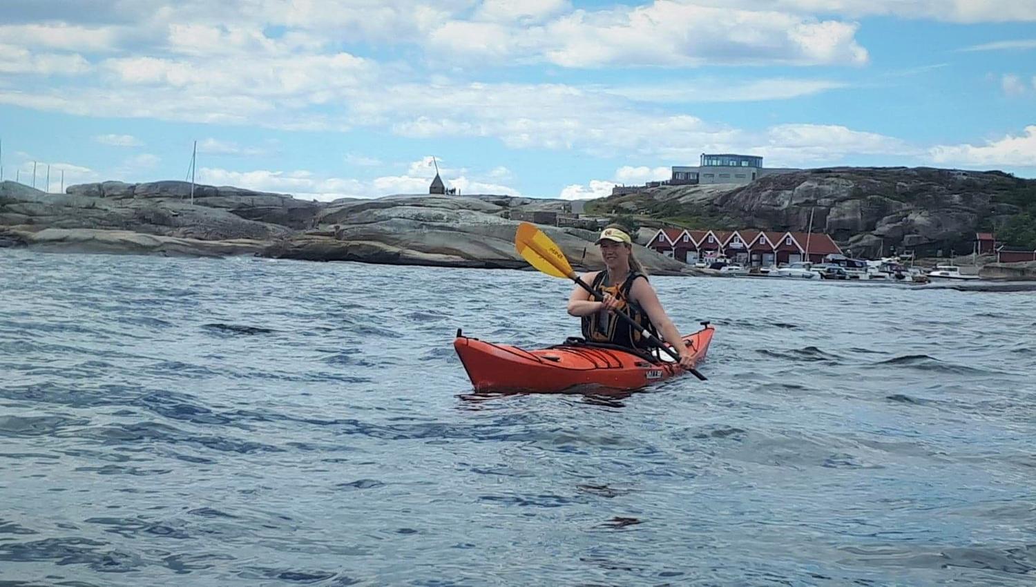 One who paddles in a kayak