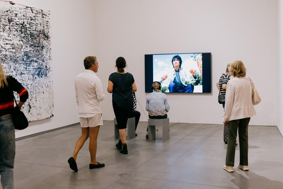 Visitors in an exhibition room