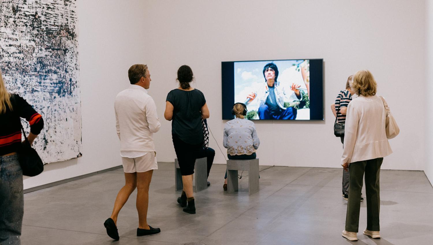 Visitors in an exhibition room