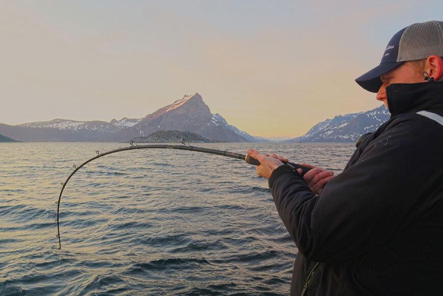 Man fishing with Explore the Arctic