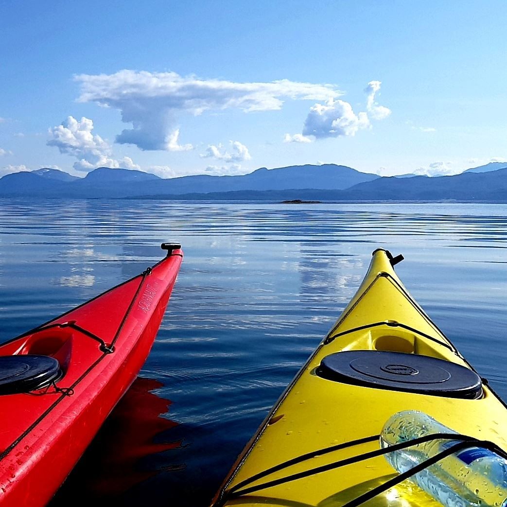 on the fjord in a kayak
