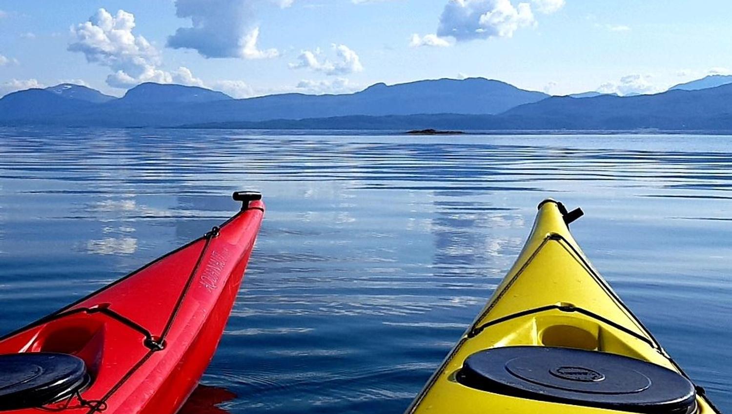 on the fjord in a kayak