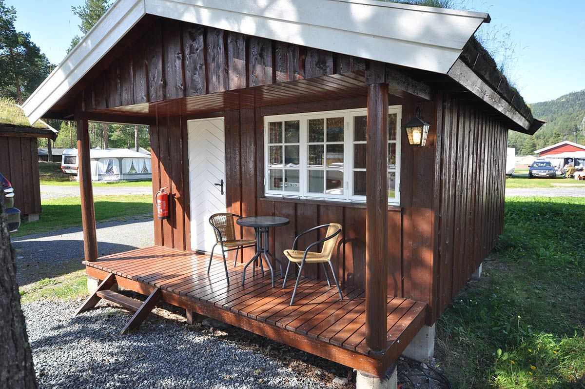 A small cabin on a campground