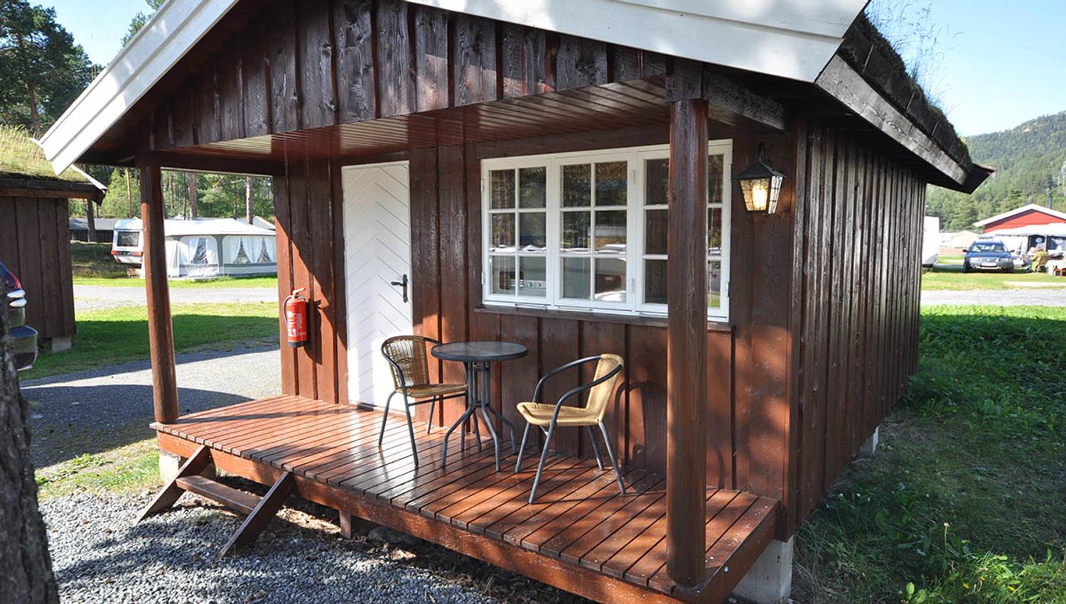 A small cabin on a campground