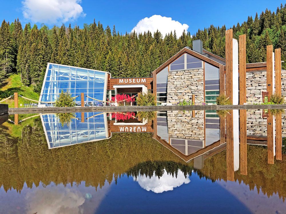 Ves-Telemark Museum reflected in the water