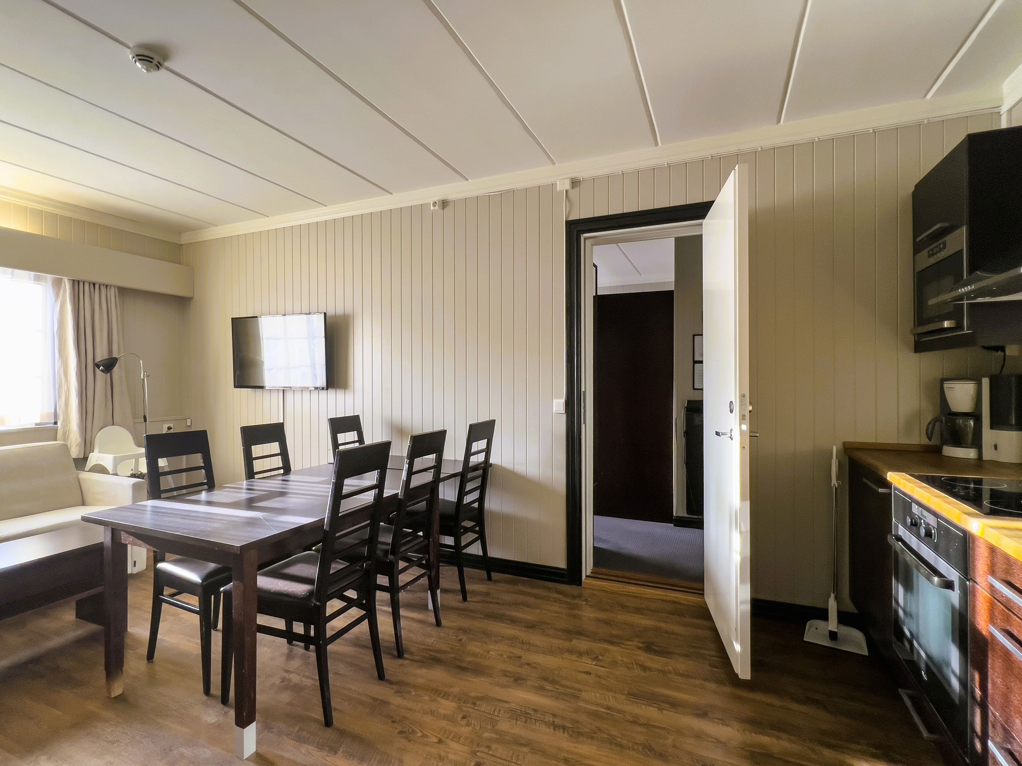 Suite with bedroom, living room and kitchen