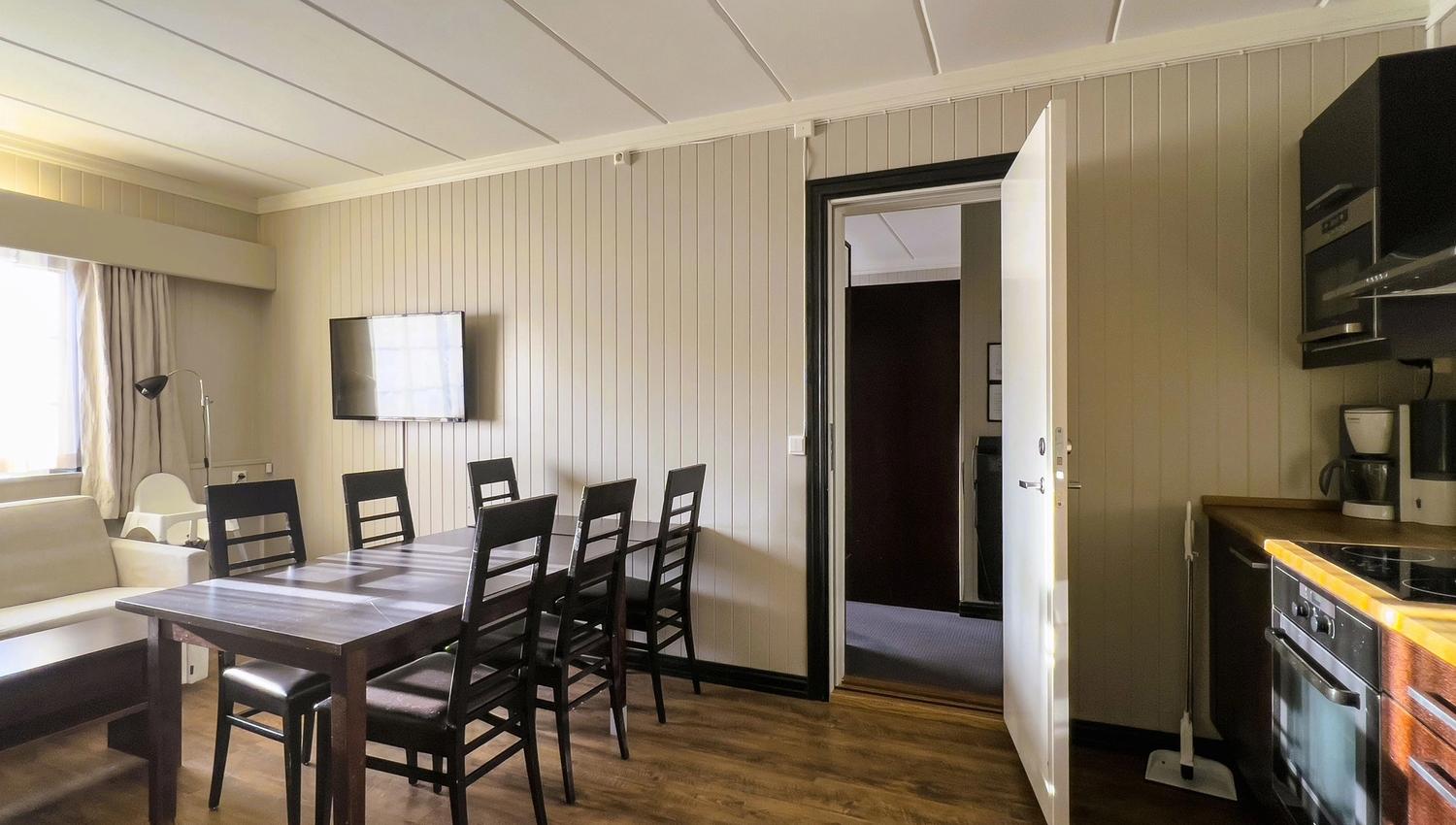 Suite with bedroom, living room and kitchen