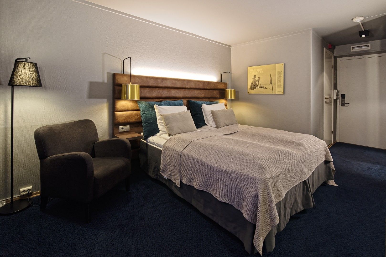 A bed in a hotel room