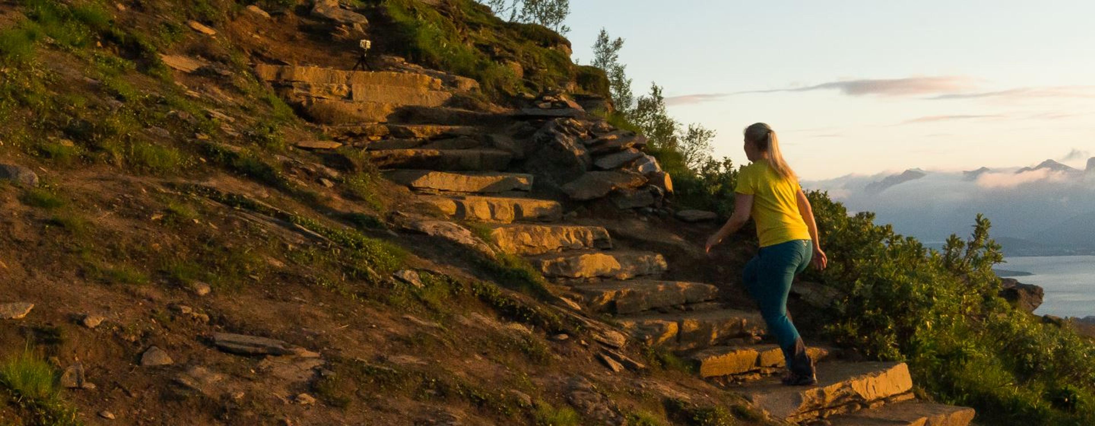 Woman walking up the Sherpa Stairs in Tromsø.