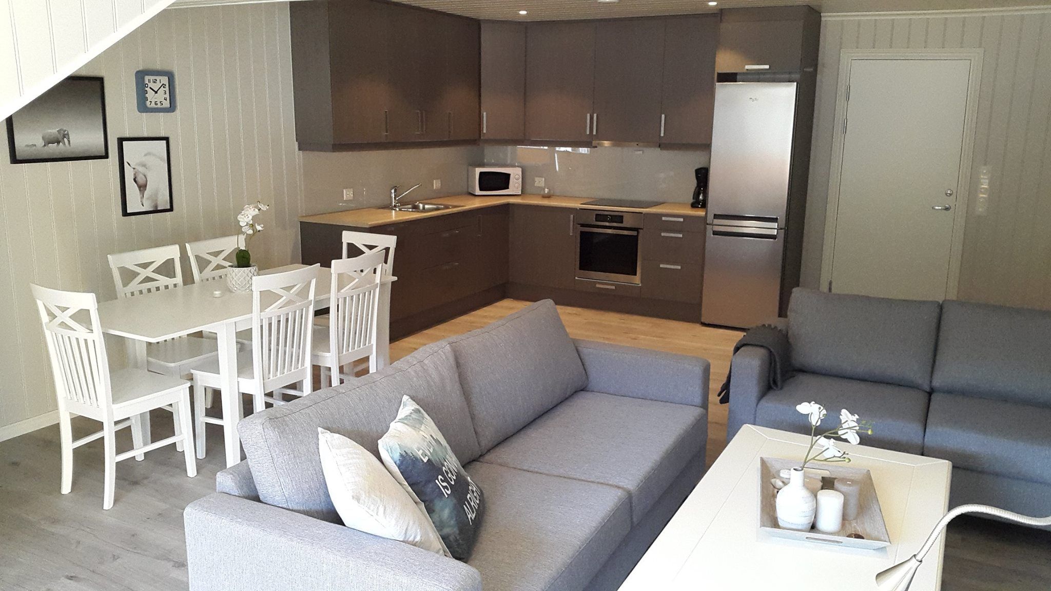 living room and kitchen in the apartment of Rognstranda camping 