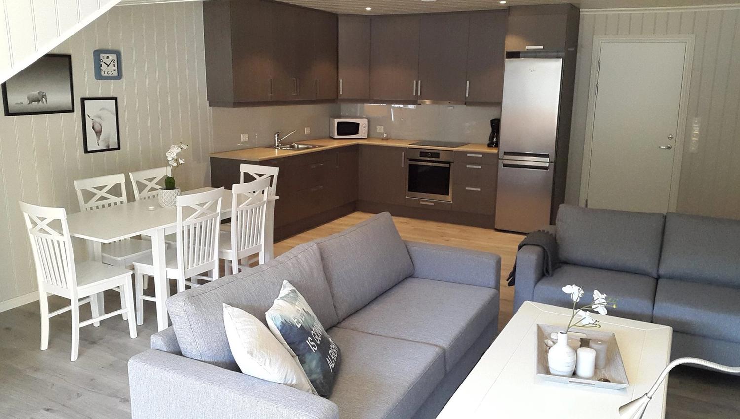 living room and kitchen in the apartment of Rognstranda camping