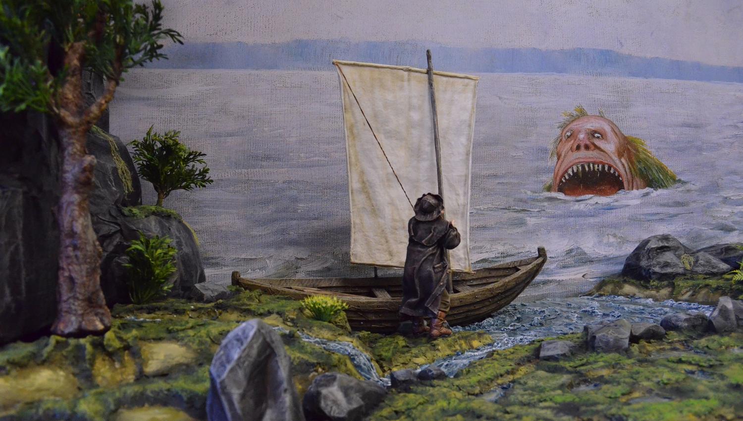 sjøtroll i havet og man med båt