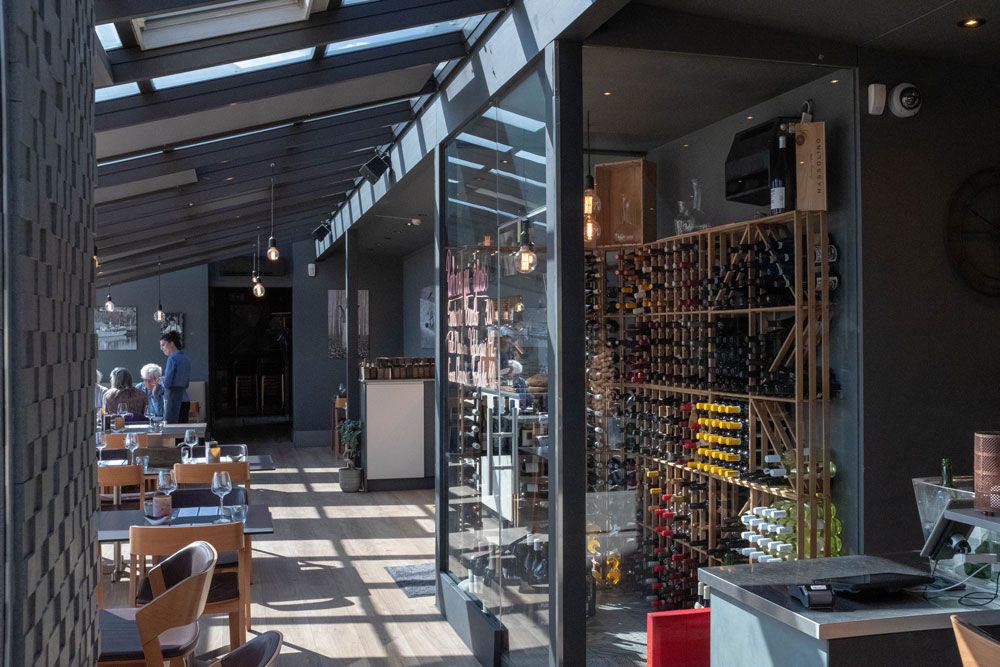 the restaurant with wine cabinet at Strøm mat & bar in Skien
