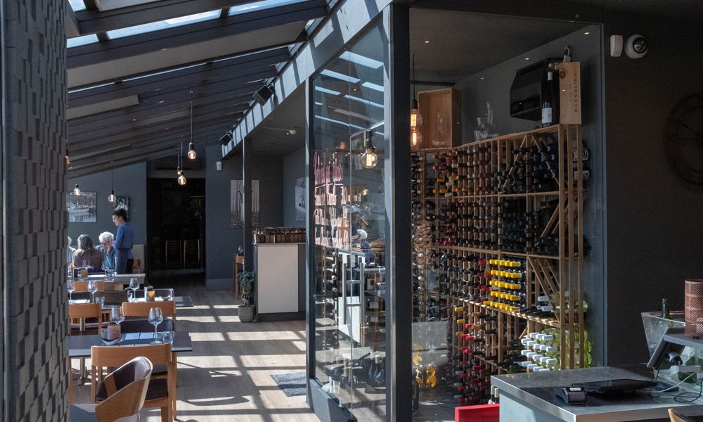 the restaurant with wine cabinet at Strøm mat & bar in Skien