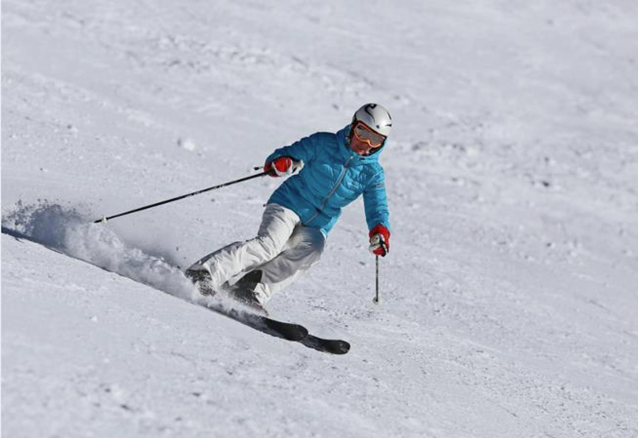 Alpinist with blue jacket